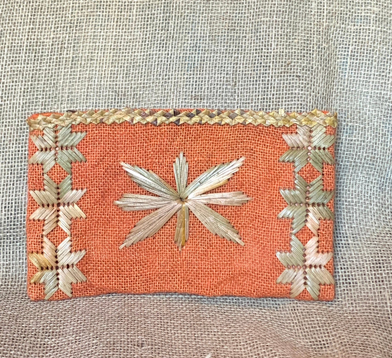 Estrela cardinal, carteira bordada