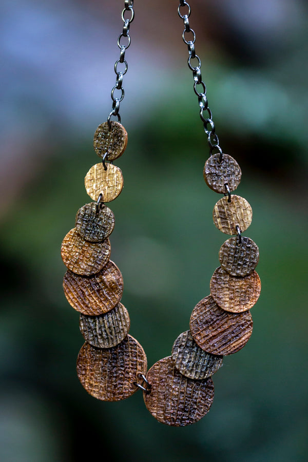 sustainable necklace with recycled materials and banana fibre