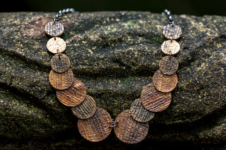 sustainable necklace with recycled materials and banana fibre