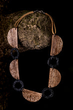 necklace made of recycled materials and natural fibre