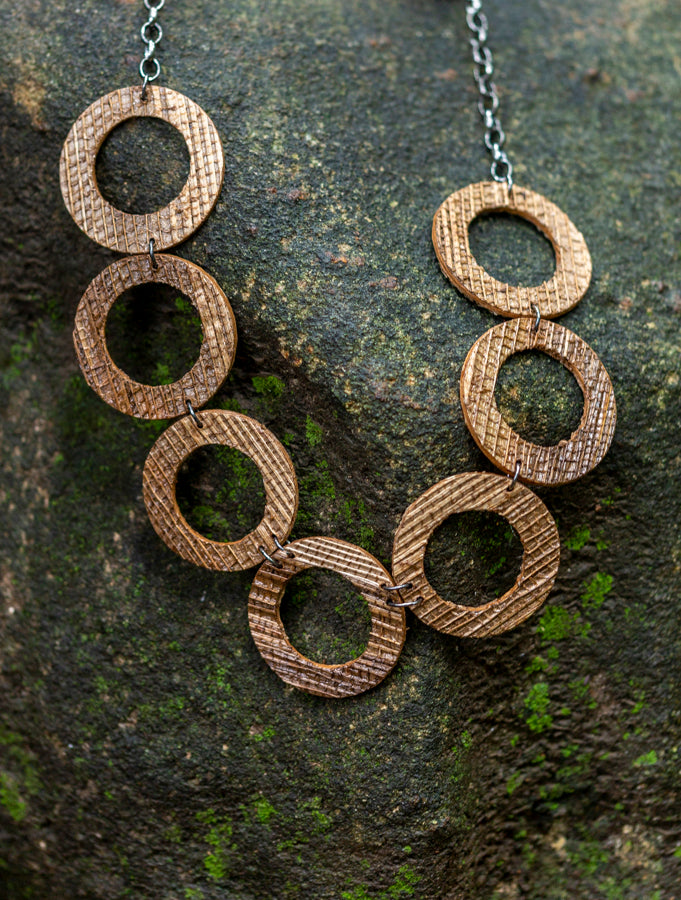sustainable rings necklace with recycled materials and banana fibre