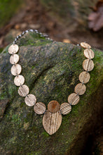 sustainable necklace with recycled materials and banana fibre